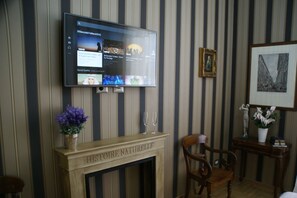 Suite Deluxe, bain à remous | Coin séjour