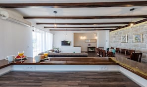 Deluxe Condo, 4 Bedrooms, Terrace, Sea View | Living area | 25-inch flat-screen TV with satellite channels, TV