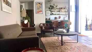 Luxury apartment in historic Bo-Kaap | Living area | Flat-screen TV, Netflix, DVD player