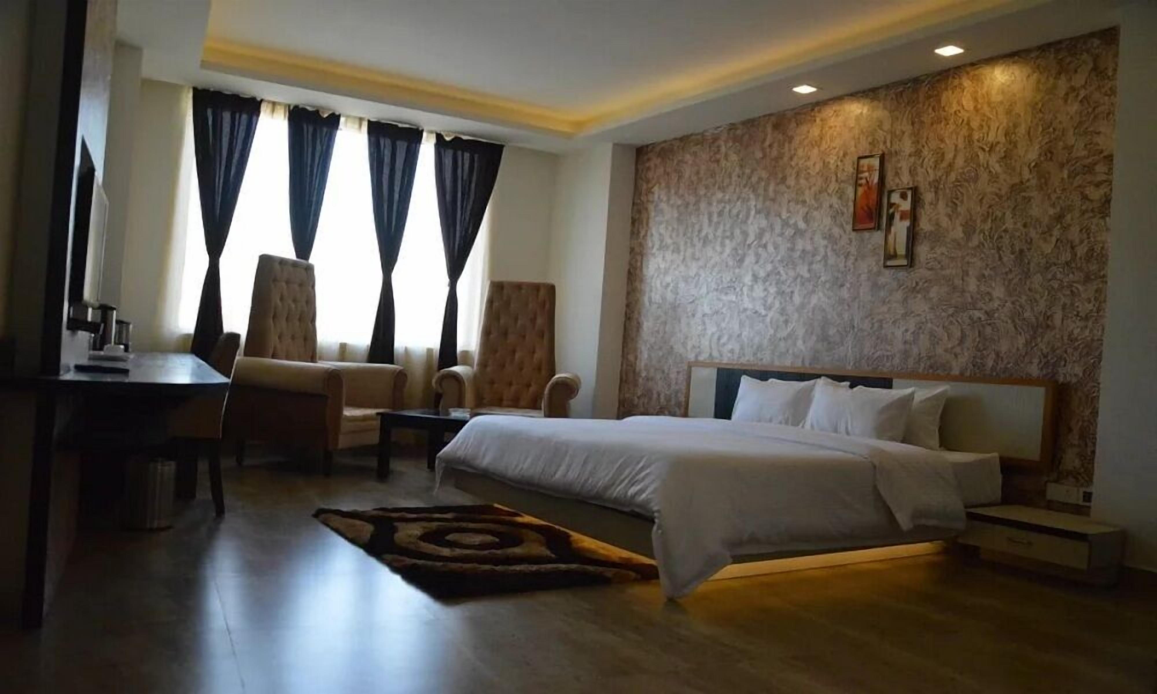 Premium bedding, in-room safe, desk, soundproofing