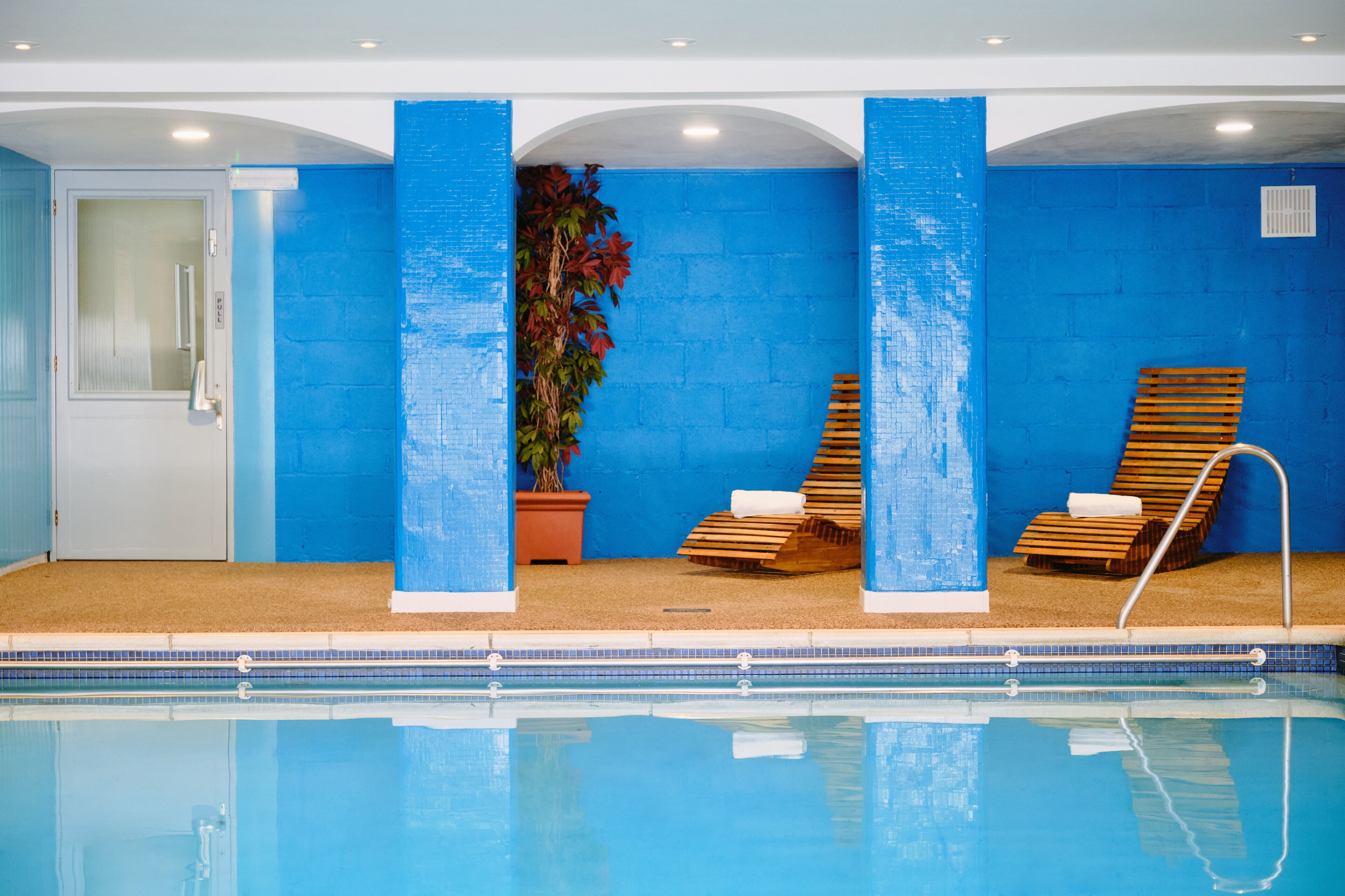 indoor pool, outdoor pool, pool loungers