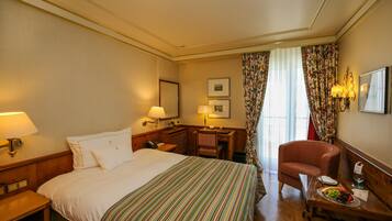 Classic Single Room | Minibar, in-room safe, desk, blackout drapes