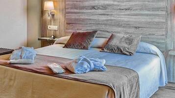 Een kluis op de kamer, gratis wifi, beddengoed