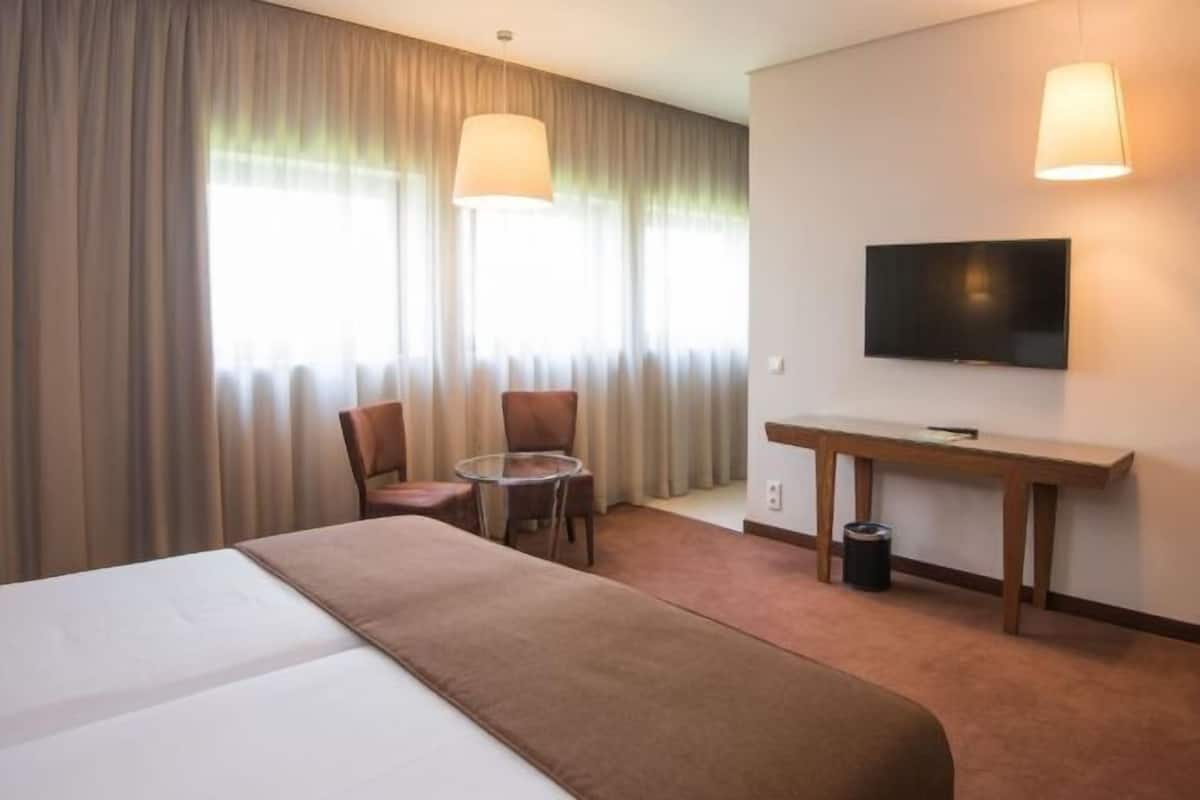 1 dormitori, minibar, caixa forta a l'habitació i cortines opaques