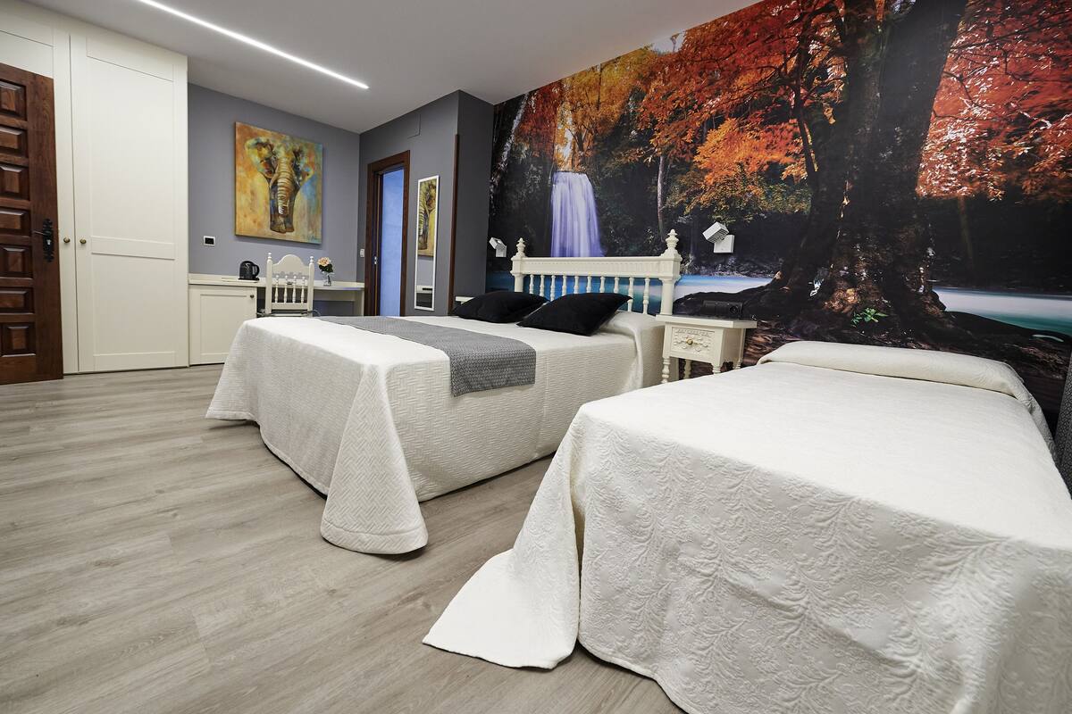 Triple Room, Terrace | Down duvets, in-room safe, individually decorated