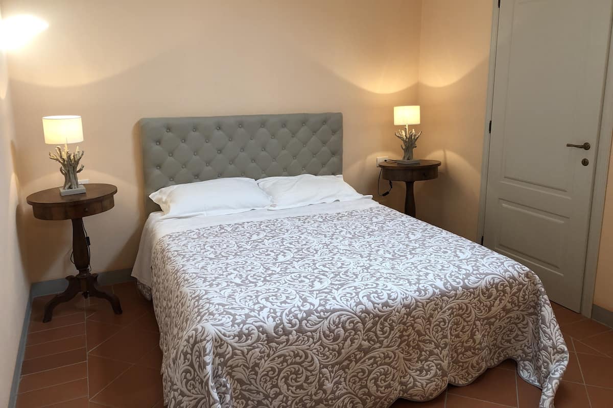 Appartement, 2 slaapkamers, 2 badkamers (Appartamento 8) | 1 slaapkamer, luxe beddengoed, een strijkplank/strijkijzer