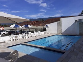 Outdoor pool, open 9:00 AM to 8:30 PM, pool umbrellas, sun loungers