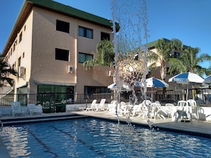 Outdoor pool, open 9:00 AM to 8:30 PM, pool umbrellas, pool loungers