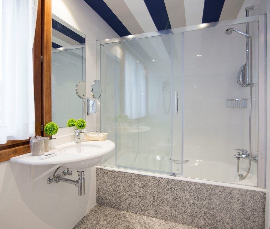 deep-soaking bathtub, rainfall showerhead, free toiletries, hair dryer