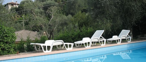 Seasonal outdoor pool, pool umbrellas, sun loungers