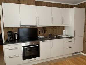 Private kitchen - Slåttastølen Leiligheter by Geilolia (Hol)