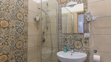 Shower, rainfall showerhead, free toiletries, hair dryer