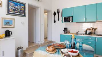 Comfort Apartment, 2 Bedrooms, Terrace, Sea View | Private kitchen | Fridge, microwave, stovetop, coffee/tea maker