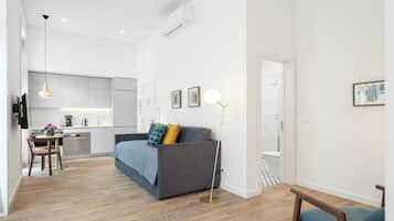 Superior Studio | Living area | Flat-screen TV