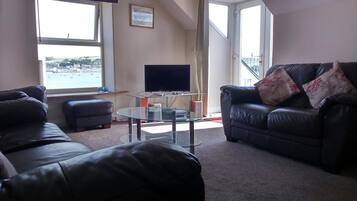 Apartment, 2 Bedrooms, River View | 2 bedrooms, in-room safe, individually furnished, iron/ironing board