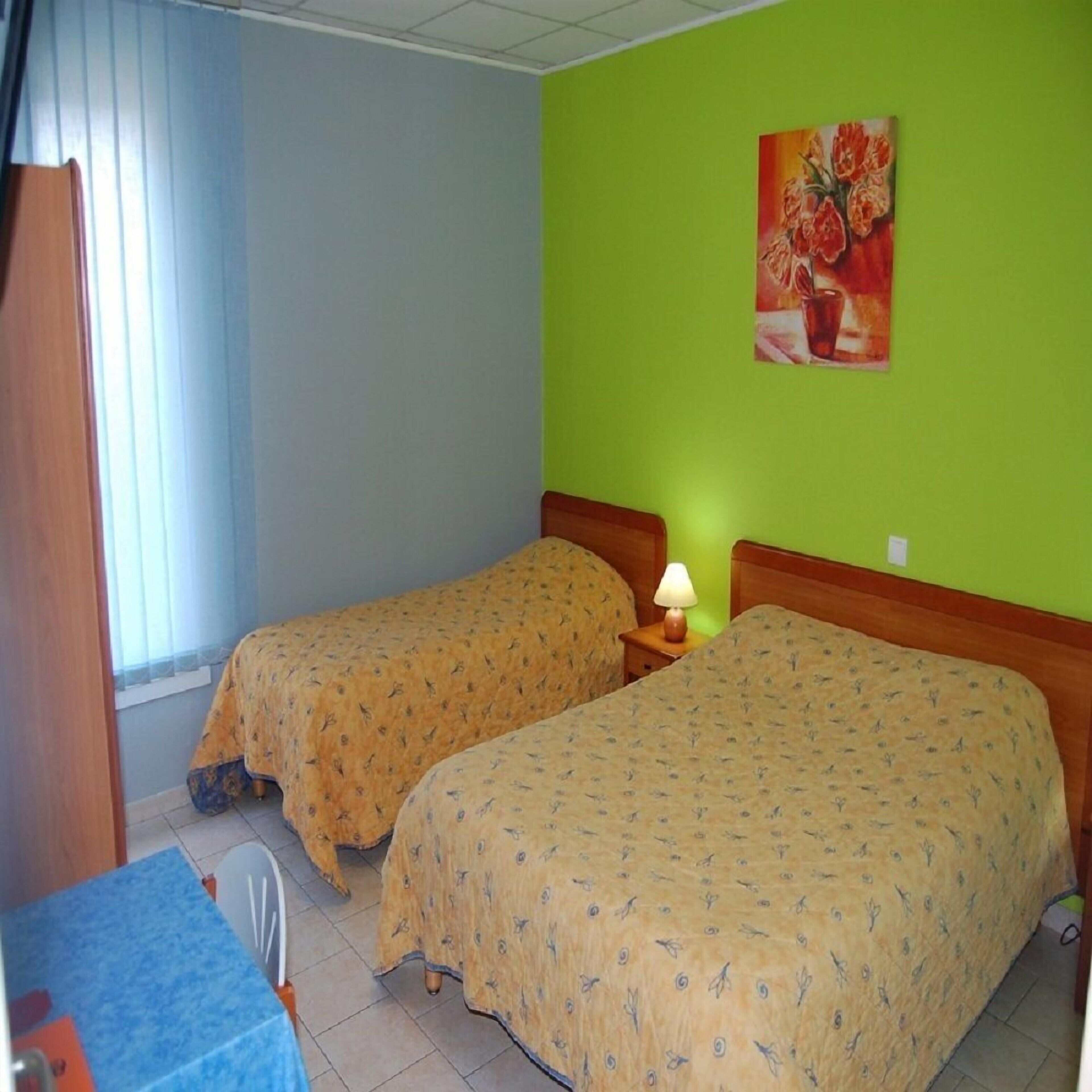Desk, free WiFi, bed sheets