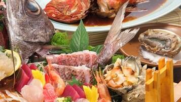A variety of seafood including a whole fish, crab, and oysters on a wooden tray.