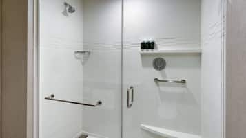 A modern shower area with a glass door, a handheld showerhead, a handheld showerhead, a glass-enclosed shower, a glass-enclosed shower, a glass-enclosed shower, a glass-enclosed shower, a glass-enclosed shower, a glass-enclosed shower, a glass-enclosed shower, a glass-enclosed shower, a glass-enclosed shower, a glass-enclosed shower, a glass-enclosed shower, a glass-enclosed shower, a glass-enclosed shower, a glass-enclosed shower, a glass-enclosed shower, a glass-enclosed shower, a glass-enclosed shower, a glass-enclosed shower, a glass-enclosed shower, a glass-enclosed shower, a glass-enclosed shower, a glass-enclosed shower, a glass-enclosed shower, a glass-enclosed shower, a glass-enclosed shower, a glass-enclosed shower, a glass-enclosed shower, a glass-enclosed shower, a glass-enclosed shower, a glass-enclosed