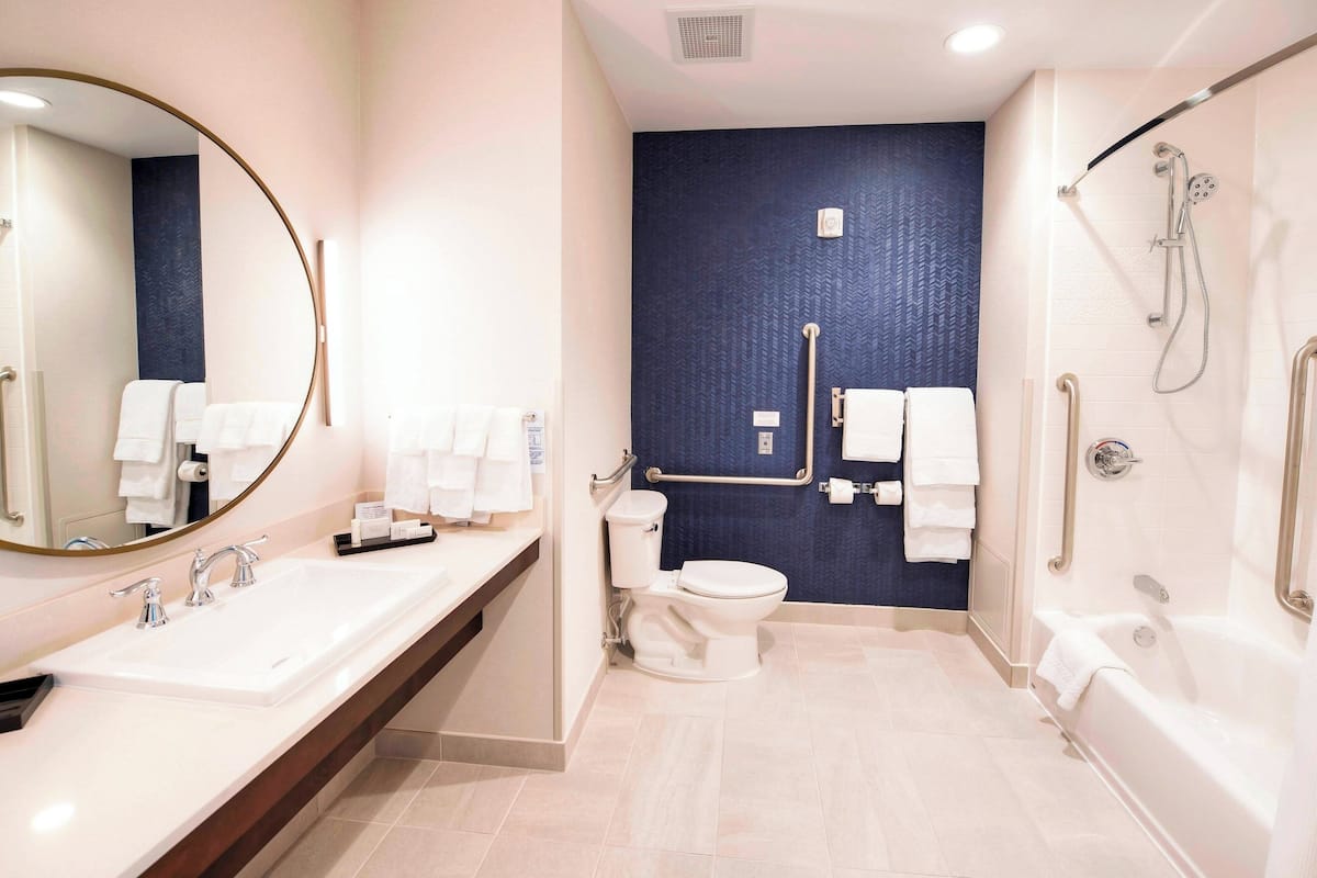 room, 1 king bed | bathroom | free toiletries, hair dryer, towels