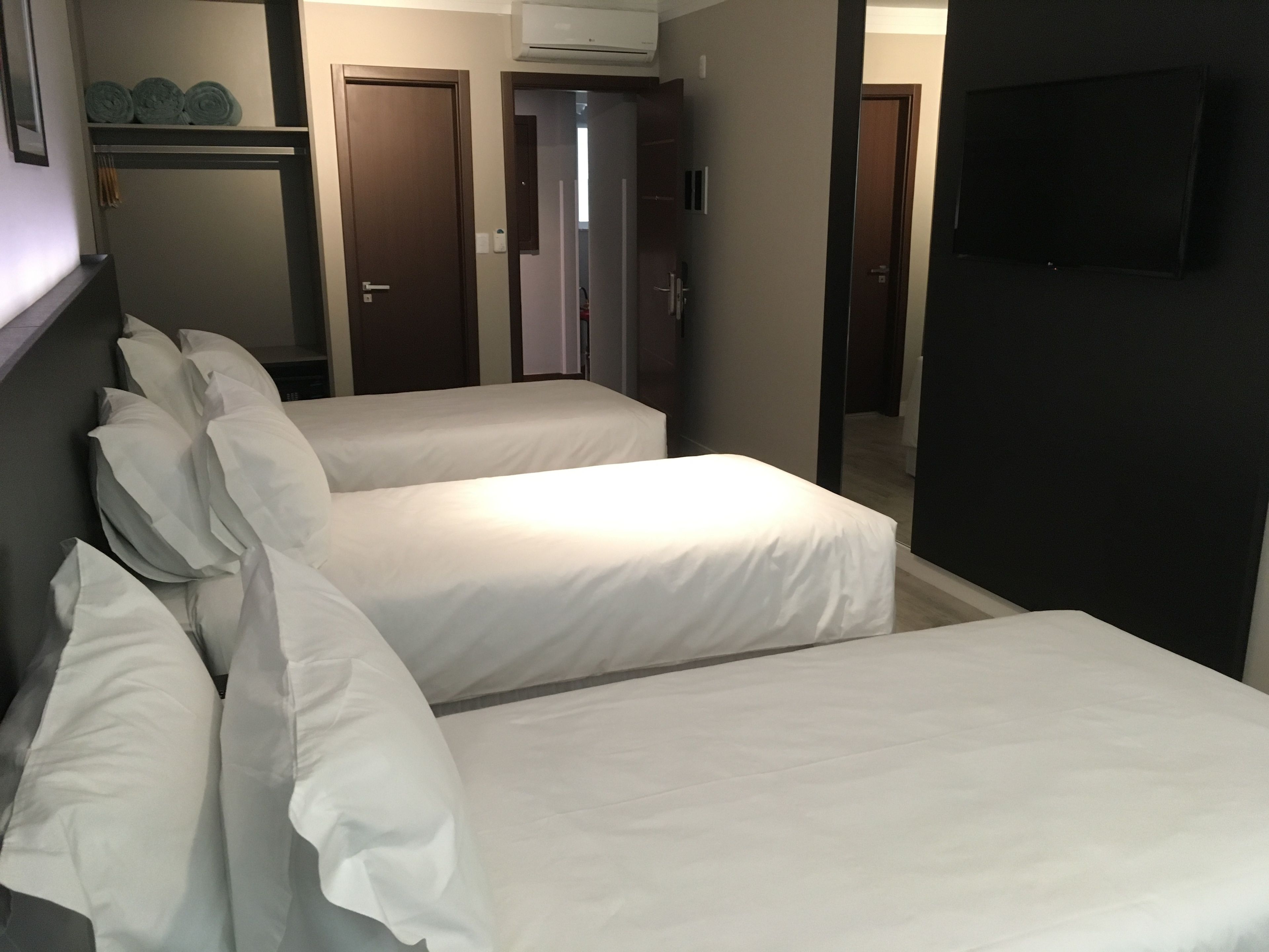 triple room, 3 single beds | minibar, in-room safe, desk, laptop workspace