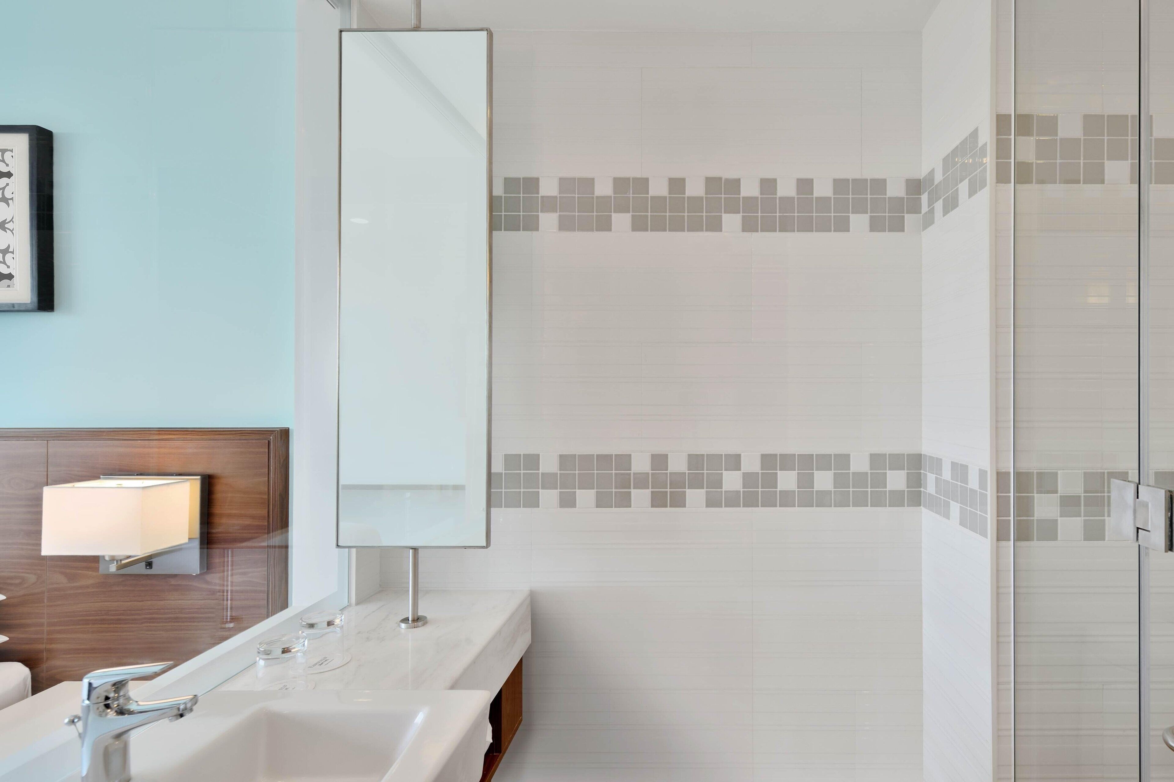 shower, rainfall showerhead, designer toiletries, hair dryer