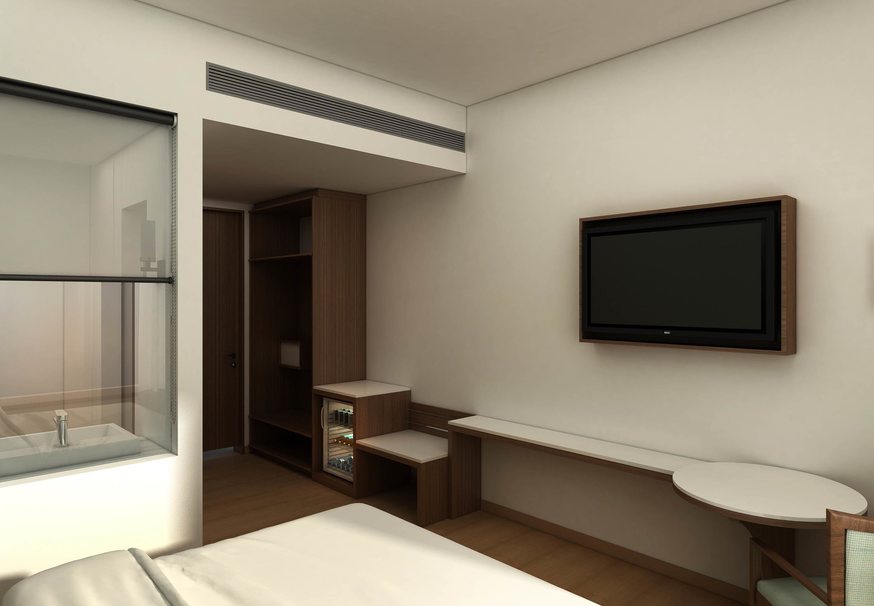 A modern hotel room with a bed, a desk, a TV, a wardrobe, and a bathroom with a glass shower.