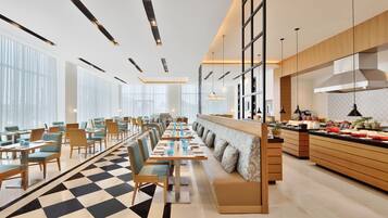 Breakfast, lunch, dinner served; local and international cuisine