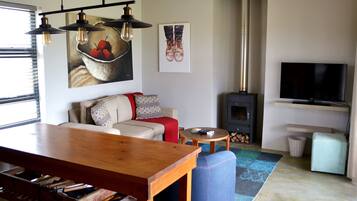 Cottage, Accessible, Mountain View | Living area | Flat-screen TV, fireplace