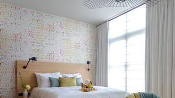 Premium bedding, memory-foam beds, in-room safe, desk