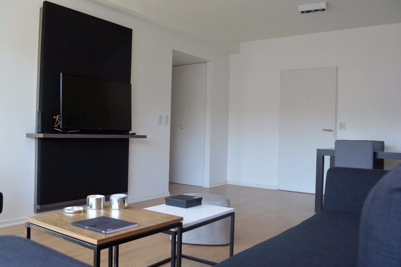 classic apartment | living area | 42-inch smart tv with cable channels, tv