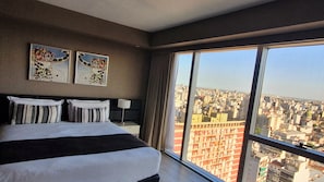 Suite estudio junior | Ropa de cama de alta calidad y minibar 