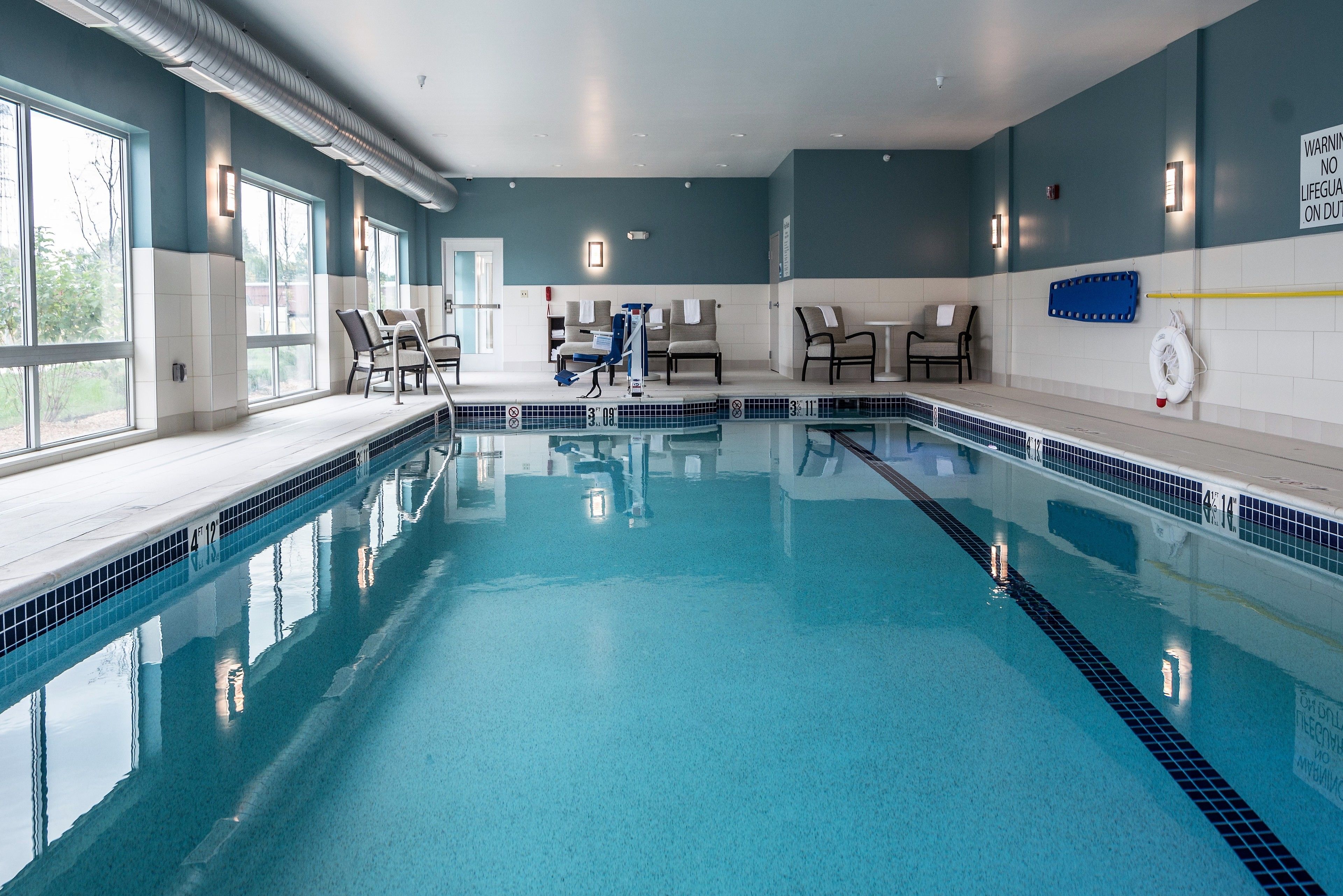 indoor pool, open 8:00 am to 9:00 pm, pool loungers