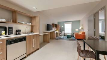 Desk, laptop workspace, blackout drapes, iron/ironing board
