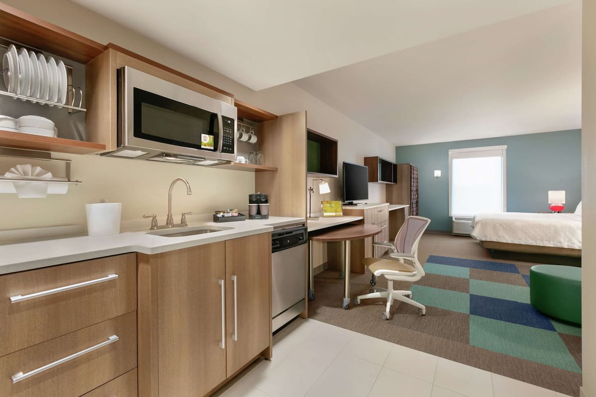 Studio, 1 King Bed, Accessible (Hearing) | Desk, laptop workspace, blackout drapes, iron/ironing board