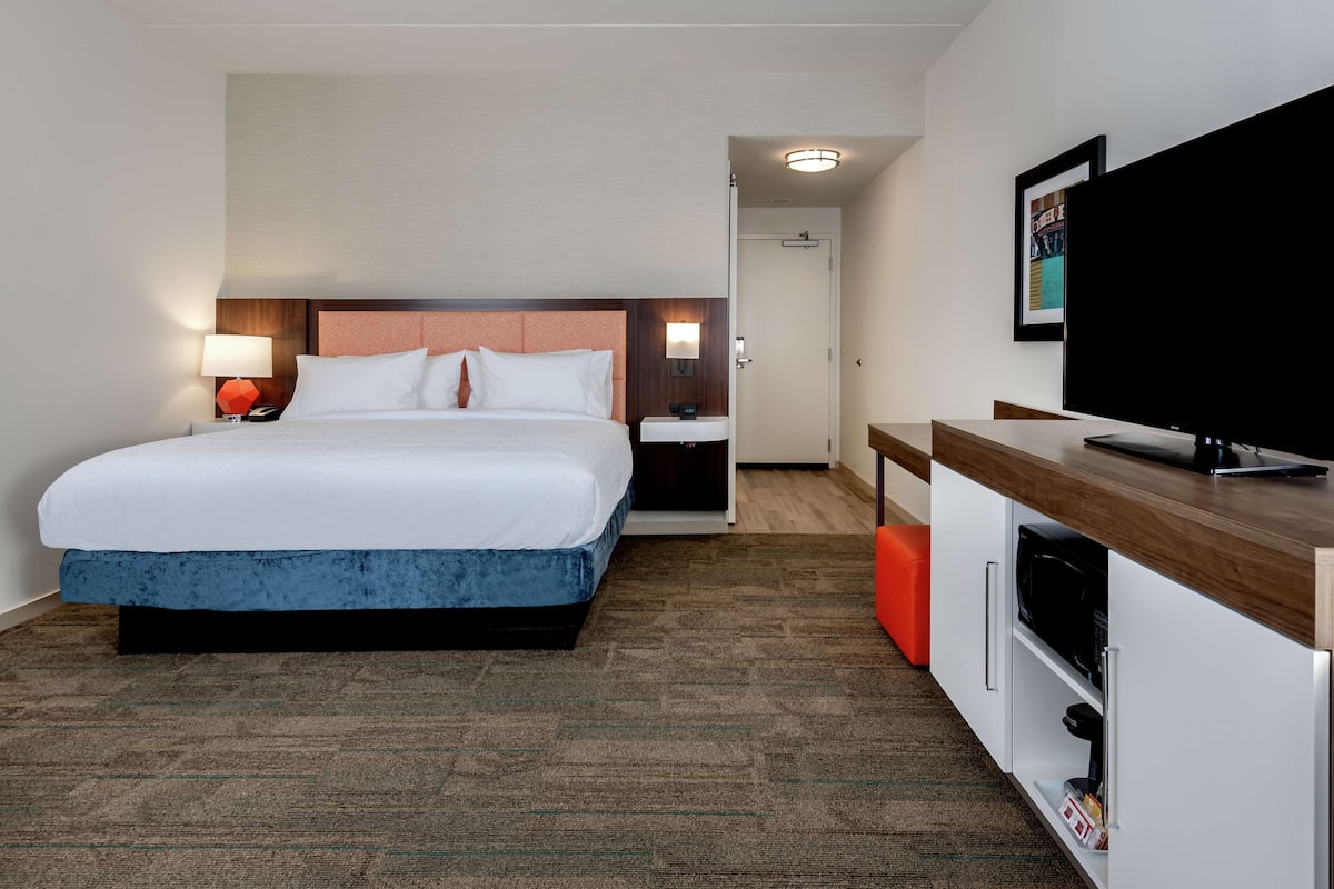 Room, 1 King Bed with Sofa bed, Refrigerator | In-room safe, desk, laptop workspace, blackout curtains