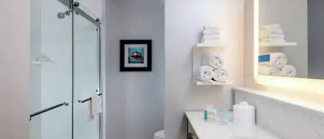Hair dryer, towels, soap, shampoo