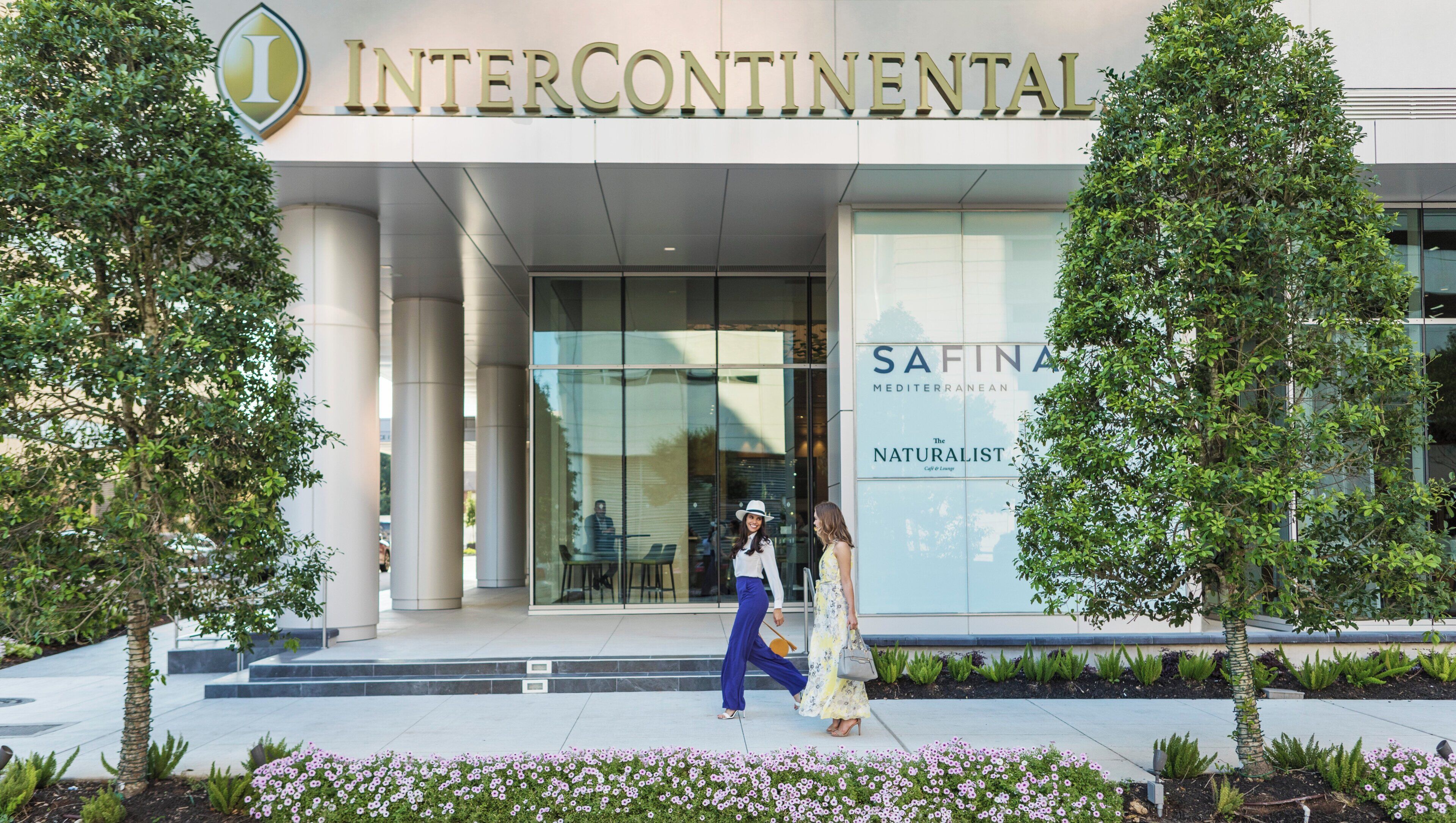 A modern building with a sign reading 'INTERCONTINENTAL' and 'SAFINA MEDITERRANEAN'.