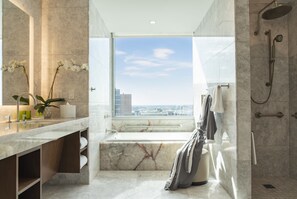 Designer toiletries, hair dryer, bathrobes, towels