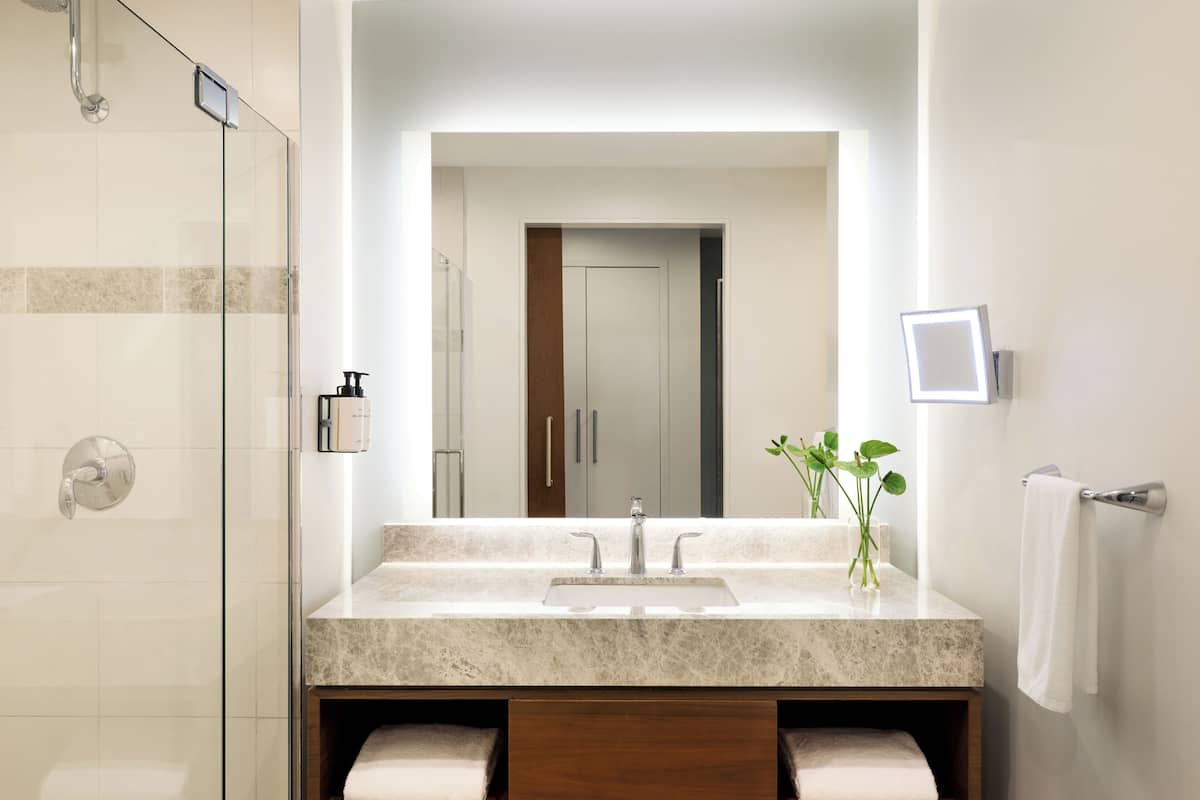 Designer toiletries, hair dryer, bathrobes, towels