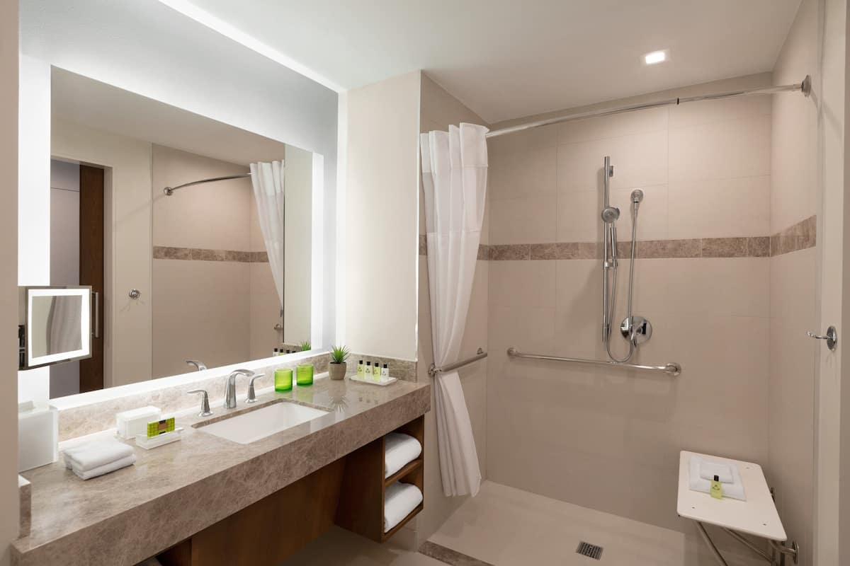 Designer toiletries, hair dryer, bathrobes, towels