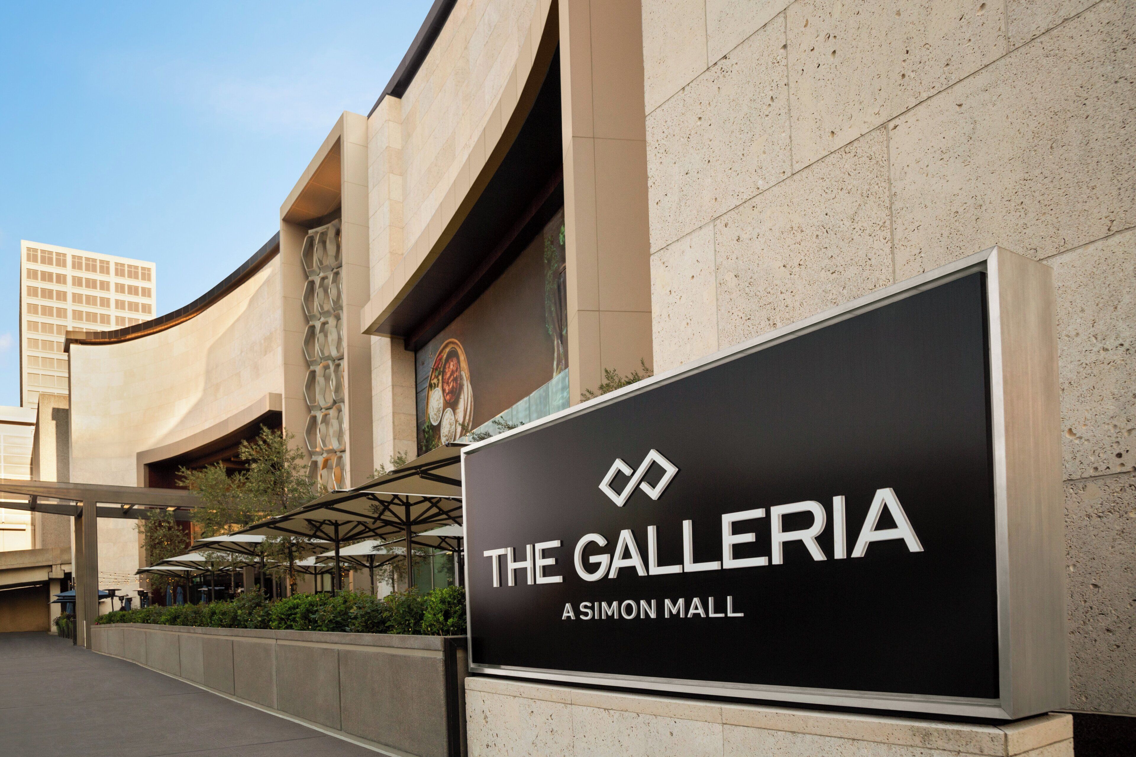 A sign for The Galleria at Asimov Mall, indicating the location of a shopping mall.