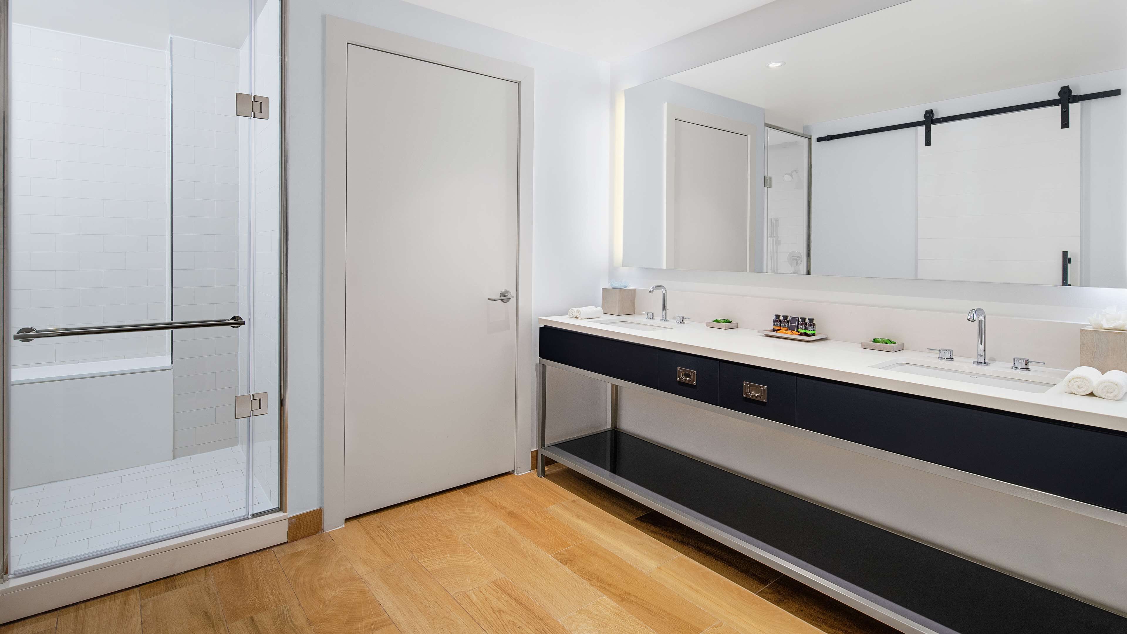 suite, 1 king bed, city view | bathroom | shower, free toiletries, hair dryer, towels