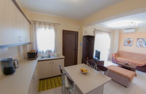Apartment, 2 Bedrooms (Maisonette) | Living area | Flat-screen TV