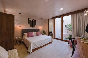 Deluxe Room, 1 Double Bed, Pool View, Garden Area | Hypo-allergenic bedding, in-room safe, individually decorated