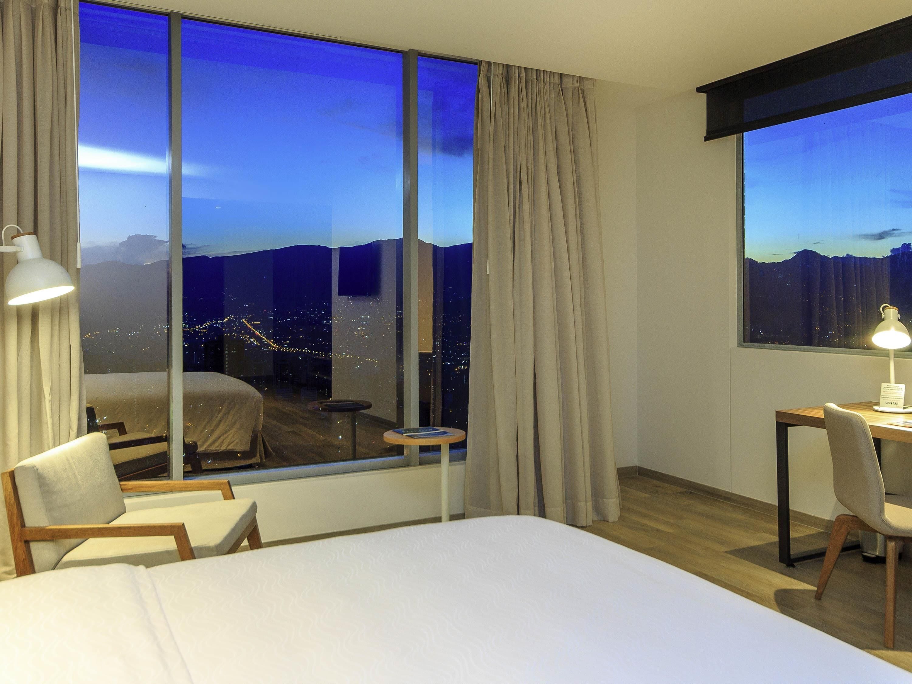 Habitación Deluxe, 1 cama King size | Ropa de cama hipoalergénica y minibar 