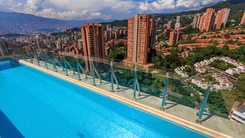 Outdoor pool, open 6 AM to 8 PM, sun loungers