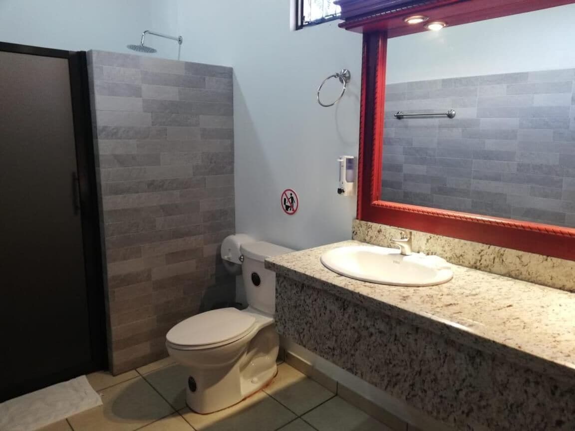 standard triple room, mountain view, ground floor | bathroom | shower, rainfall showerhead, free toiletries, hair dryer