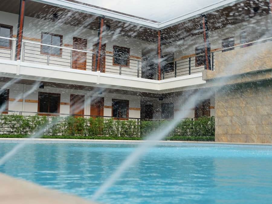 Outdoor pool, a natural pool, open 6 AM to 11 PM, free pool cabanas