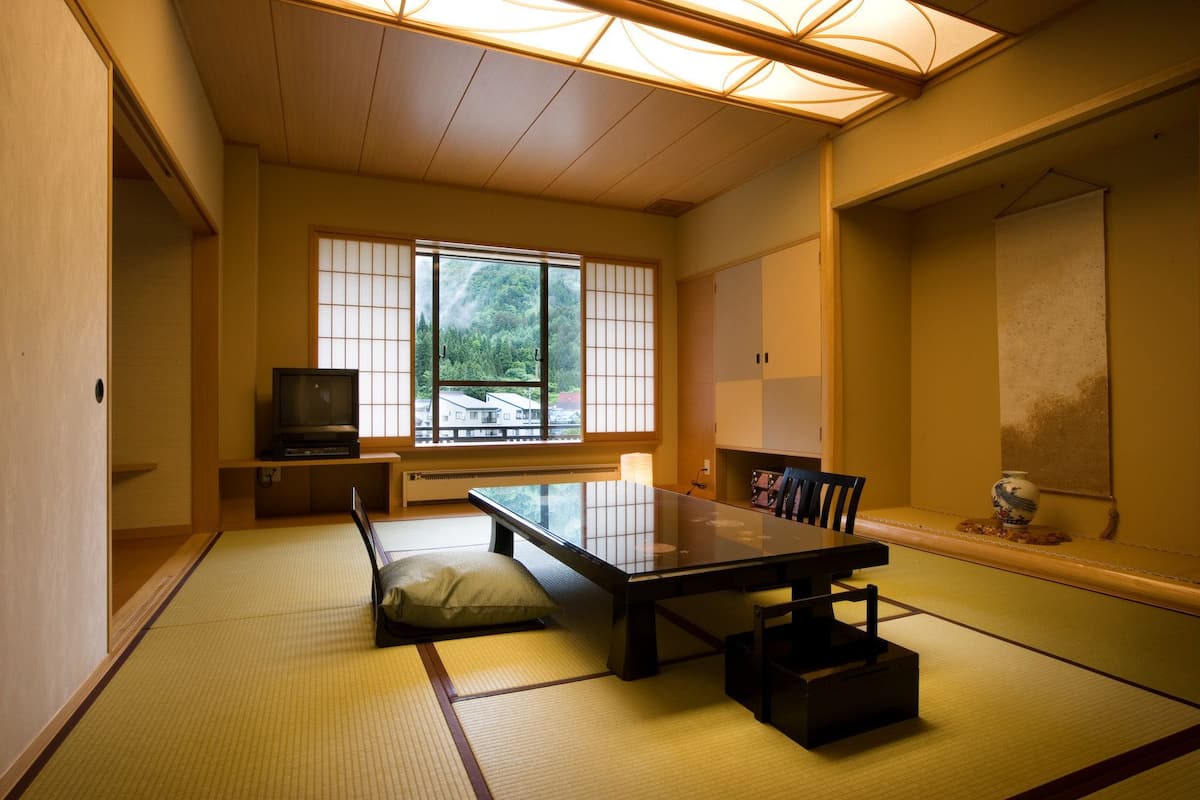 Suite, Non Smoking | Minibar, in-room safe, desk, free WiFi