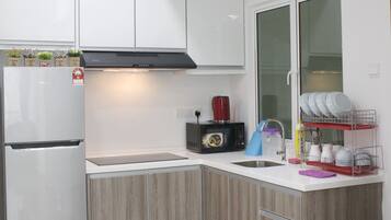 Apartment, 2 Bedrooms | Private kitchenette | Full-sized fridge, microwave, stovetop, electric kettle